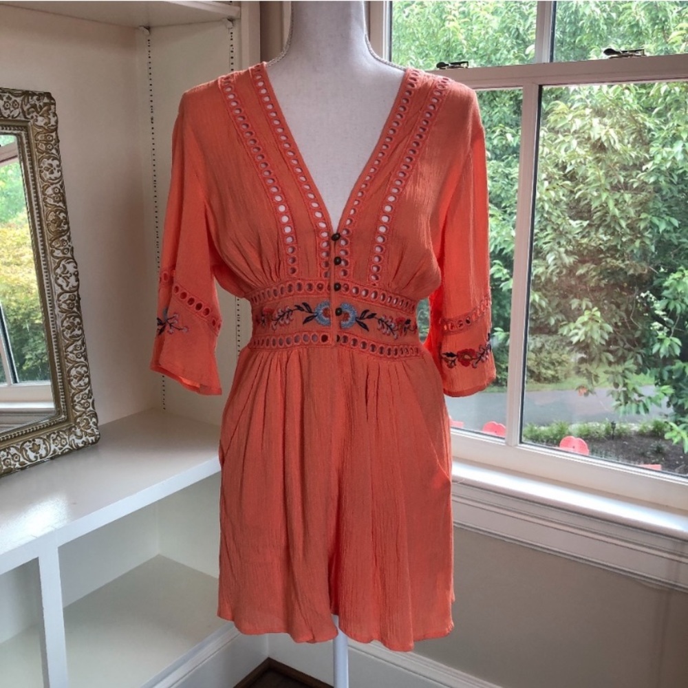 NWOT Romper shorts on bottom with a beautiful top!
